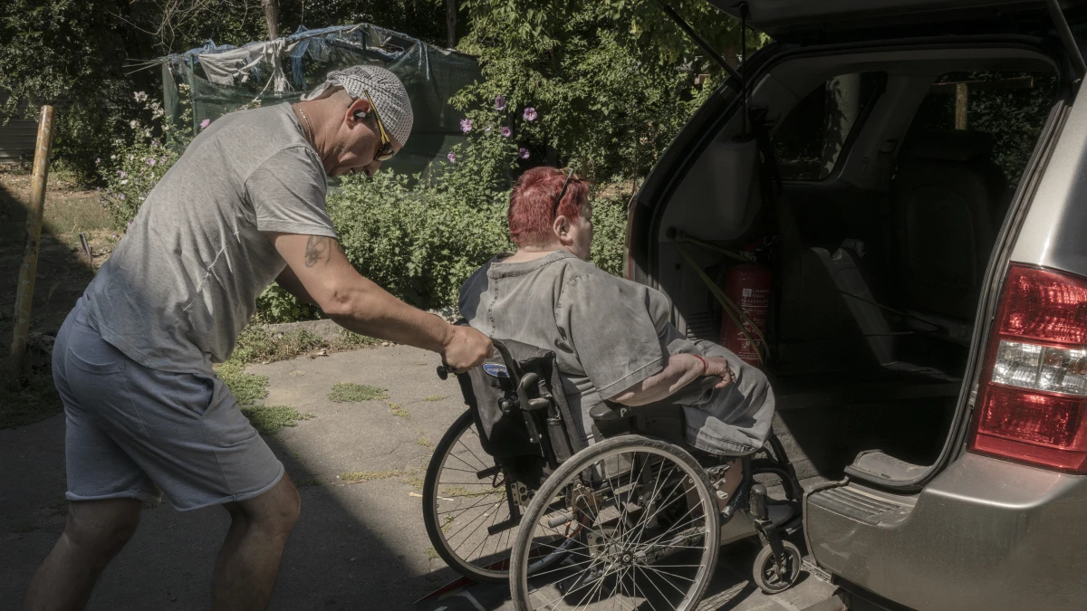 Keeping Kherson moving: A social taxi provides a vital connection in a city under attack