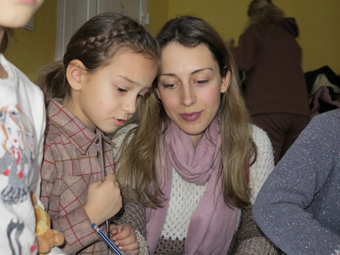 Mother Mariana and her daughter Dasha attend every class at the CFS