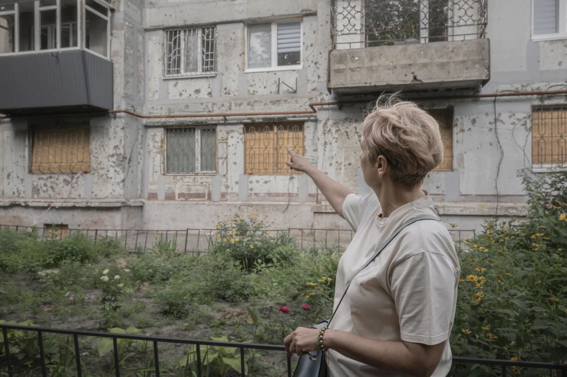 Anna shows us the damage to her apartment
