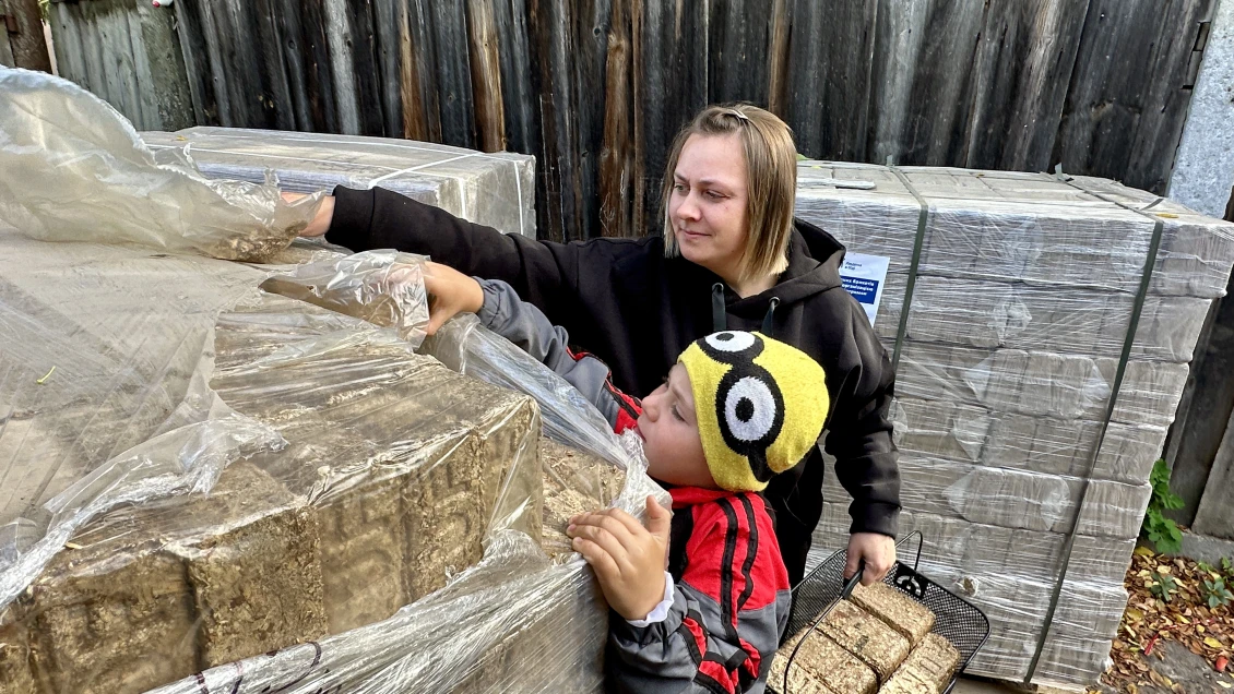 Yuliia with her younger son Oleksandr